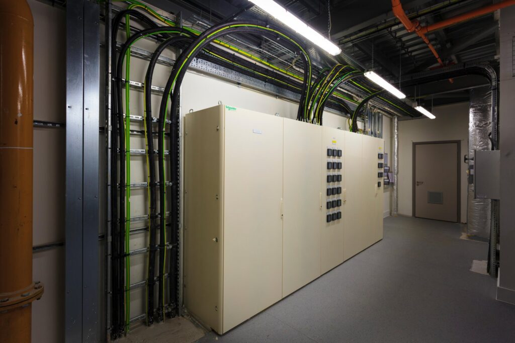 E7FF4Y Cabling to electrical control boxes in plant room.